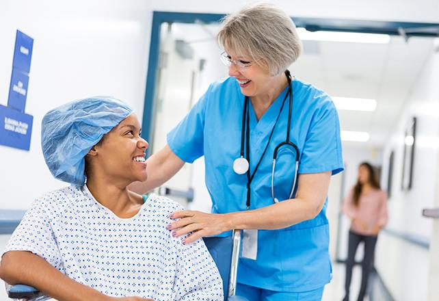 nurse smiling with patient